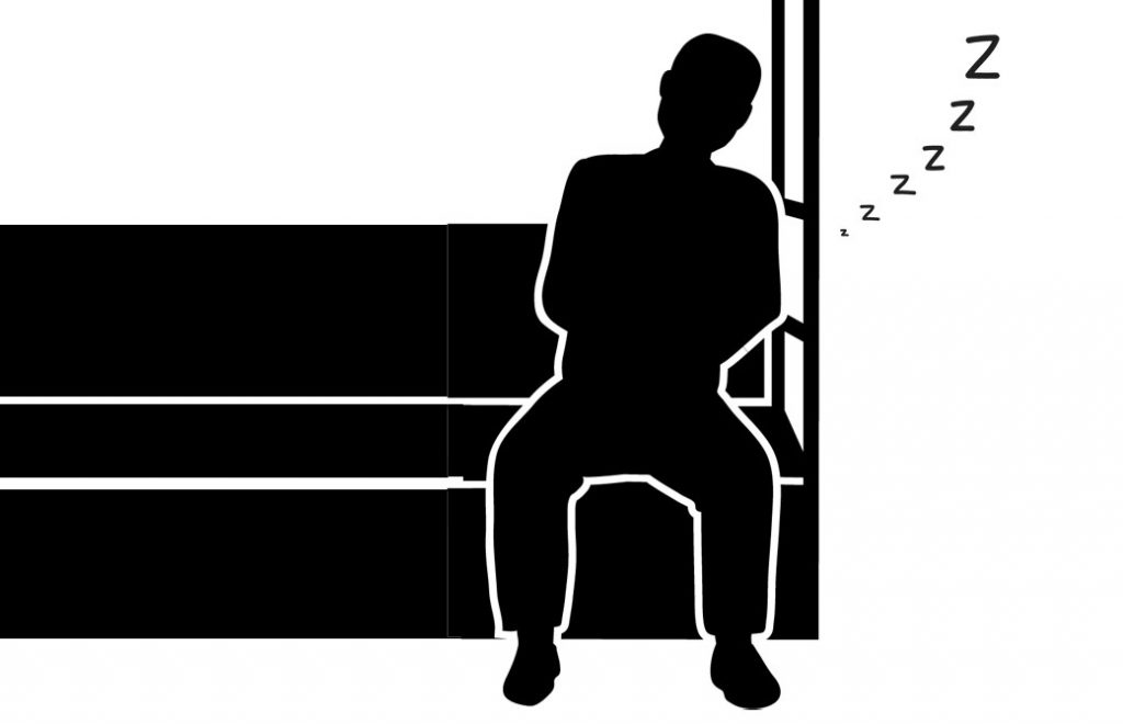 電車で寝ているサラリーマン